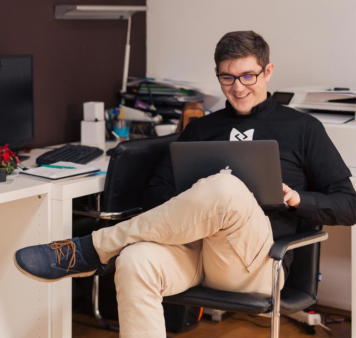 image of a software developer on a laptop